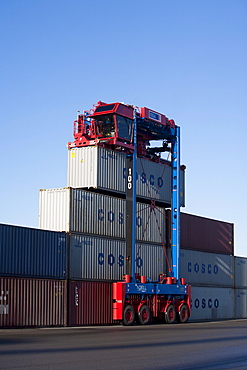 Straddle carrier with freight container, Port of Hamburg, Germany