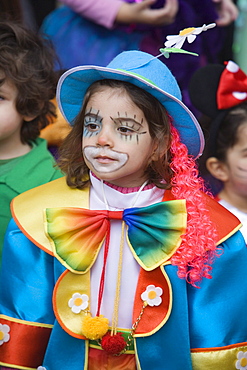 Girl dressed up as a clown at Carnival, Funchal, Madeira, Portugal