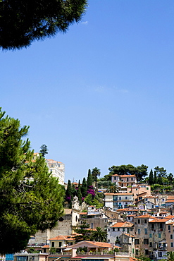 Italian houses at a mountainside in the sunlight, San Remo, Liguria, Italy, Europe