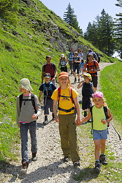 Group of hikers with children, Bavarian Alps, Upper Bavaria, Bavaria, Germany