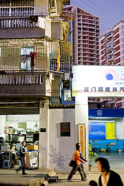 People on the street in the evening, Siming, Xiamen, Fujian province, China, Asia