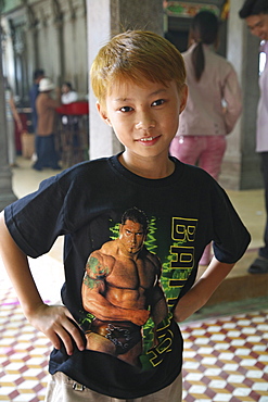 Vietnamese boy with wrestler fan t-shirt, Saigon, Vietnam, Vietnam, Asia