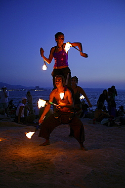 Jugglers and fire-eaters at CafÃˆ del Mar Ibiza, Balearic Island, Spain