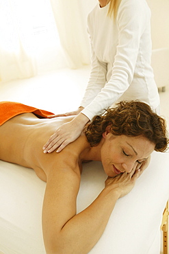 Young woman receiving ayurveda treatment, Wellness