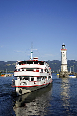 Excursion Ship, Port entrance with New Lindau Lighthouse, Lindau, Bavaria, Germany