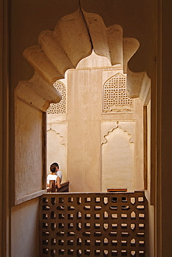 People hugging inside Fort Jabrin, Oman, Asia