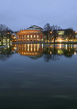 View over Lake Eckensee to the Opera House at Oberer Schlossgarten at night, Stuttgart, Baden-Wurttemberg, Germany