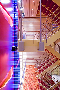 Interior view of the illuminated staircase of cruise ship AidaDiva