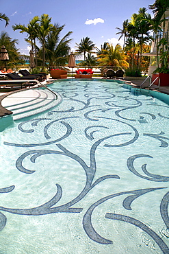 The pool of the Victor Hotel in the sunlight, Ocean Drive, South Beach, Miami Beach, Florida, USA