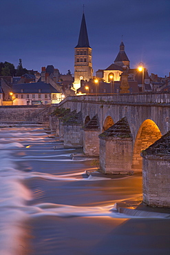 Evening in the old town of La-CharitâˆšÃ‰Â¬Â©-sur-Loire, Stone bridge over the Loire river, Church and former monastery Ste Croix Notre Dame, The Way of St. James, Chemins de Saint Jacques, Via Lemovicensis, La-CharitâˆšÃ‰Â¬Â©-sur-Loire, Dept. Nievre, Burgundy, France, Europe