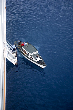 Pilot cutter alongside Cruiseship MV Columbus, Tonga, South Pacific, Oceania