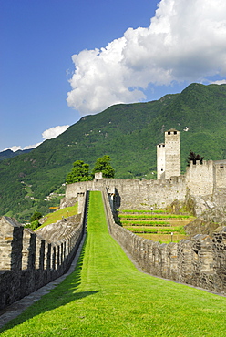 Castle Castelgrande with defence walls, towers Weisser Turm and Schwarzer Turm in UNESCO World Heritage Site Bellinzona, Bellinzona, Ticino, Switzerland