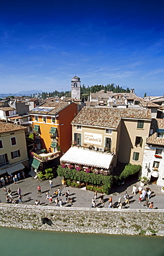 View at houses and people in the sunlight, Sirmione, Lake Garda, Lombardy, Italy, Europe