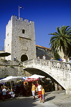 People at the city gate at the Old Town of Korcula, Korcula island, Croatian Adriatic Sea, Dalmatia, Croatia, Europe