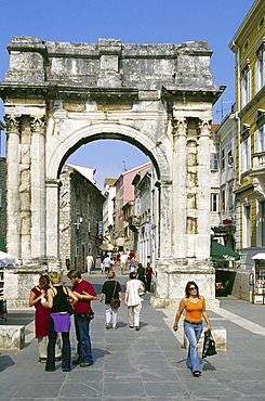 People in front of a gate at the Old Town of Rovinj, Croatian Adriatic Sea, Istria, Croatia, Europe