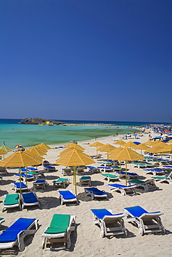 Nissi Beach with sun loungers and sunshades, Agia Napa, South Cyprus, Cyprus