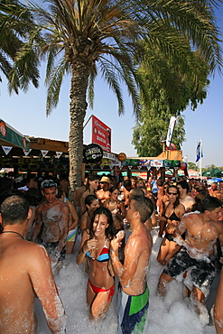 A group of young people dancing at a foam party, beach party, Nissi Beach, Agia Napa, South Cyprus, Cyprus