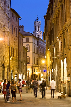 Via Banchi di Sopra and the top of the city hall tower, Siena, Tuscany, Italy