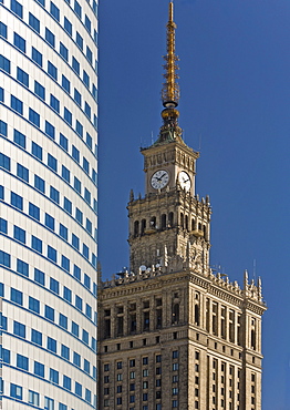 The Palace of Culture and Sciences next to the Zlote Tarasy shopping Complex, Warsaw, Poland, Europe