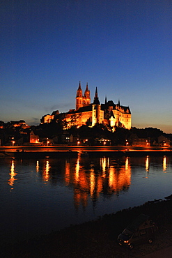 the illuminated cathedral and the old town at Elbe river in the evening, Meissen, Saxony, Germany, Europe