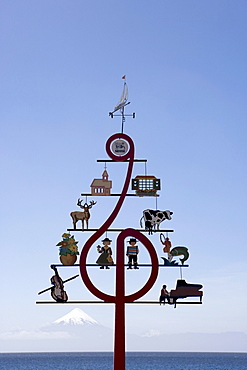 Musical Tree Sculpture at Lago Llanquihue lake with view of Osorno Volcano, Frutillar, Los Lagos, Patagonia, Chile, South America, America