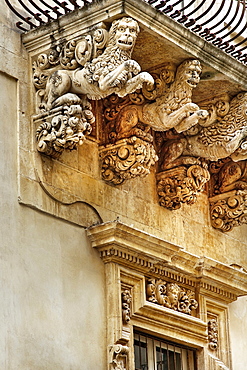 Baroque balcony, Palazzo Nicolai, Noto, Sicily, Italy