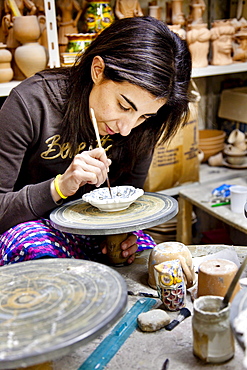 Women painting pottery, Caltegirone, Sicily, Italy