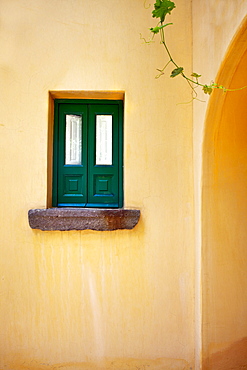 Window and yellow wall, Hotel Signum, Malfa, Salina Island, Aeolian islands, Sicily, Italy