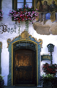 House decorated with traditional painting Lueftlmalerei in the village of Wallgau, Bavaria, Germany