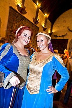 Young women perform at Bunratty Castle Medieval Banquet, County Clare, Ireland