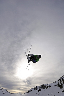 Freeskier during jump, Stubai glacier, Stubai Alps, Tyrol, Austria, Europe