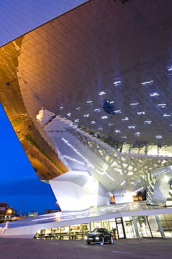 Porsche Museum in Stuttgart-Zuffenhausen in the evening, designed by the architects Delugan Meissl Associated Architects in cooperation with HG Merz, Stuttgart, Baden-Wuerttemberg, Germany, Europe