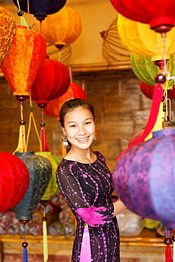 Woman inside a lampion store, Hoi An, Annma, Vietnam