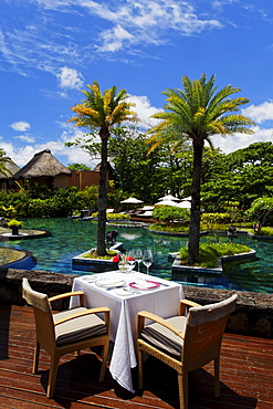 Pool and restaurant of the Shanti Maurice Resort in the sunlight, Souillac, Mauritius, Africa