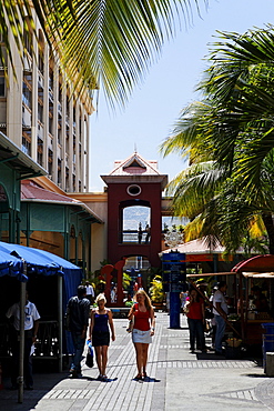 People in front of the Le Caudan Waterfront shopping center, Port Louis, Mauritius, Africa