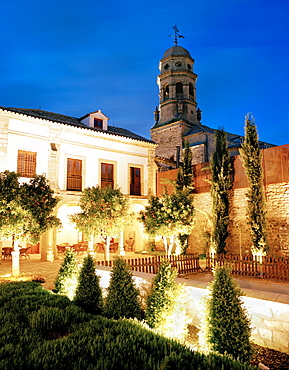 Courtyard of hotel Puerta de la Luna with orange trees, at night, historic centre beneath the cathedral, Baeza, Andalusia, Spain