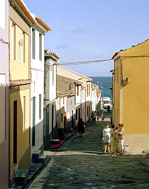 Fischermen's houses along small street in coastal town Rabo de Peixe, Sao Miguel island, Azores, Portugal