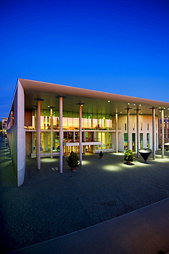 Illuminated concert hall in the evening, Freiburg im Breisgau, Baden-Wuerttemberg, Germany, Europe