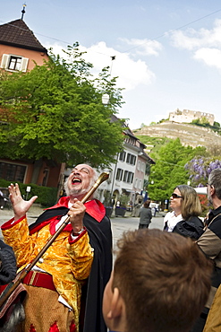 Disguised tourist guide with group of tourits, Staufen, Baden-Wuerttemberg, Germany, Europe