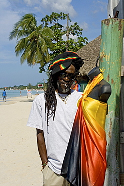 Jamaica Negril beach cool Rastafari man in front of fashion shop