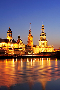 Illuminated city of Dresden with Staendehaus, Georgentor gate, Dresden castle and cathedral, river Elbe in the foreground, Dresden, Saxony, Germany, Europe