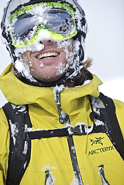 Snwo-covered face of a snowboarder, Chandolin, Anniviers, Valais, Switzerland