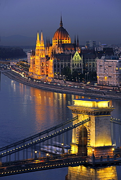 View of Danube river, Chain Bridge and House of Parliament at night, Budapest, Hungary, Europe