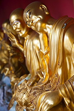 Golden Buddha statues at Wat Tham Khao Noi, Khao Noi Cave Temple, near Kanchanaburi, Thailand