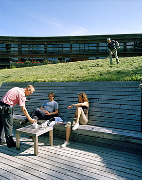 Waiter serving drinks to hotel guests, Vigilius Mountain Resort, Vigiljoch, Lana, Trentino-Alto Adige/Suedtirol, Italy