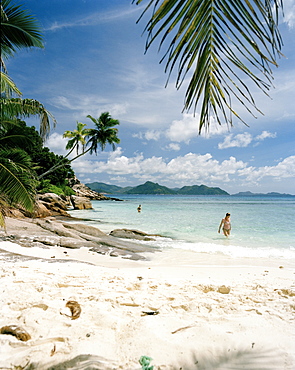 People at Anse Severe Beach, north western La Digue, La Digue and Inner Islands, Republic of Seychelles, Indian Ocean