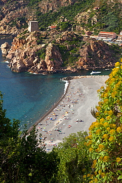 Porto and the beach and the genoese tower in the background, Corsica, France