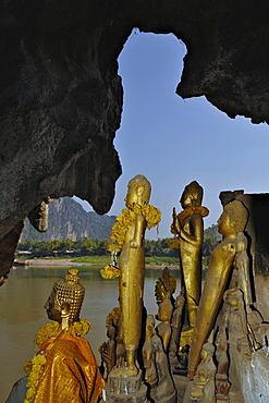 Buddha statues, Pak Ou caves, Mekong river, north of Luang Prabang, Laos