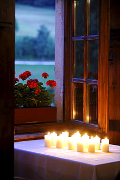 Candles on a table in the evening, Alto Adige, South Tyrol, Italy, Europe