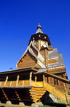 Wooden house under blue sky at Ismailowo Park, Moscow, Russia, Europe